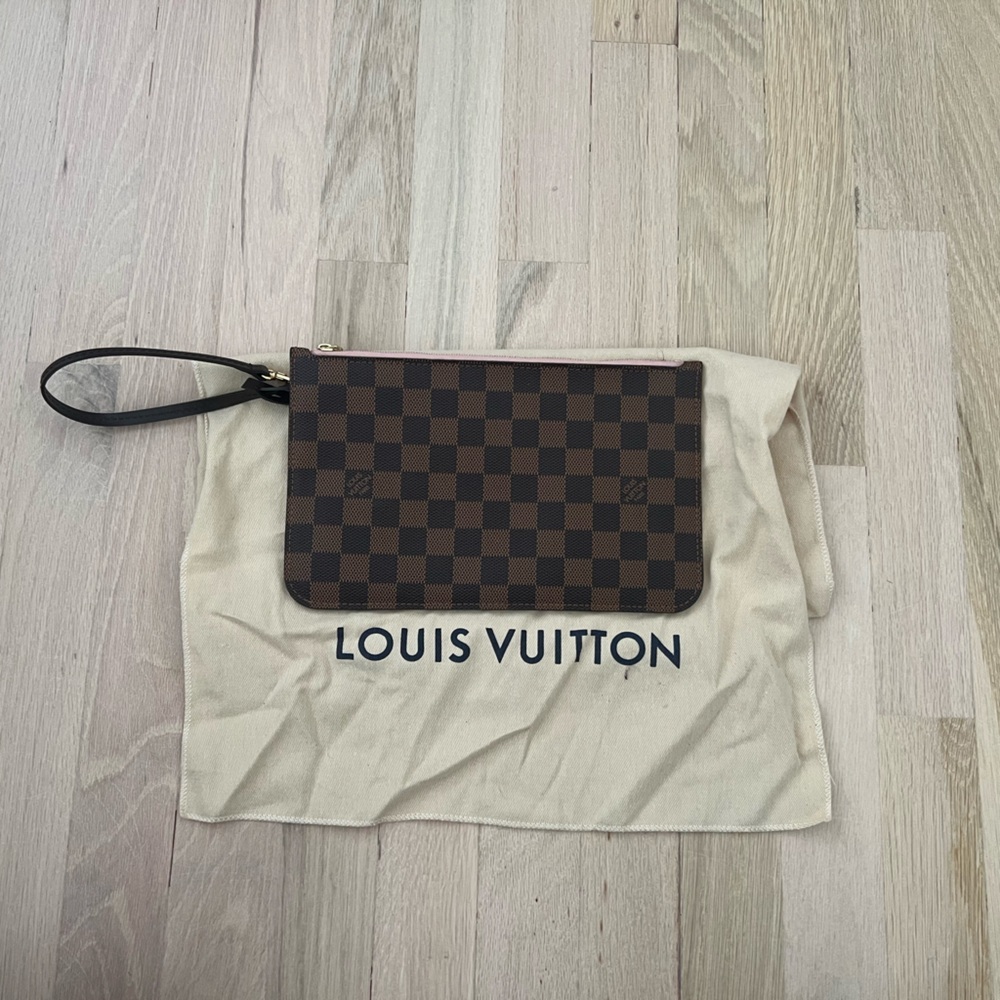 Authentic Louis Vuitton clutch with wristlet